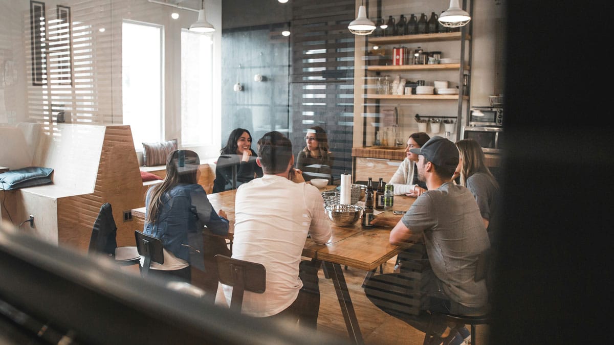 A group of executives in a discussion, coaching and development