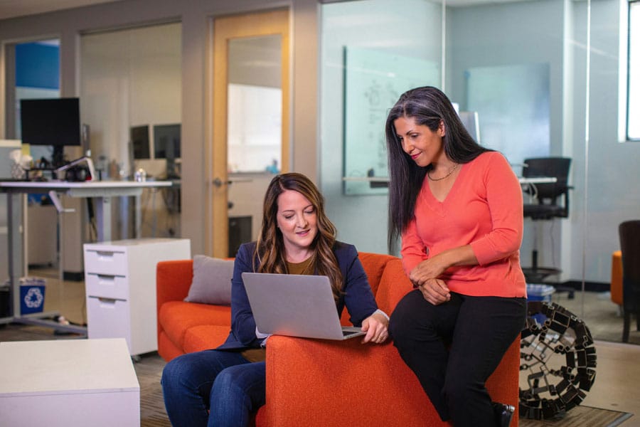 Professional women executive leaders in a casual discussion